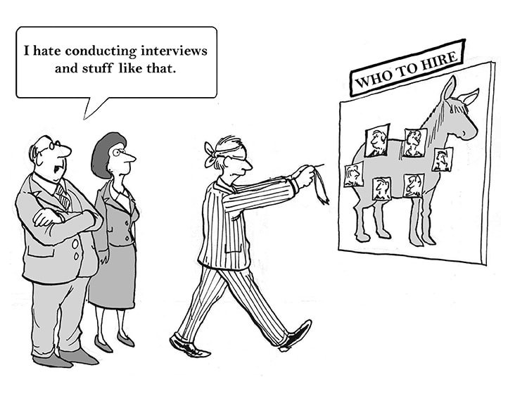 Cartoon about recruitment.  A blindfolded businessman choses who to hire with a pin. The caption reads 'I hate conducting interviews and stuff like that'